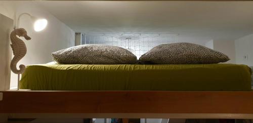 Ένα ή περισσότερα κρεβάτια σε δωμάτιο στο Koper Center Apartment