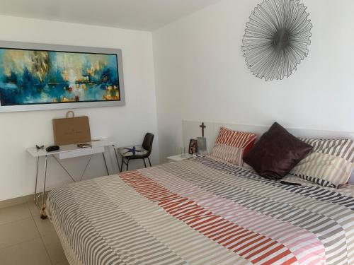 Ένα ή περισσότερα κρεβάτια σε δωμάτιο στο Condominios Nauticos Nuevo Paracas