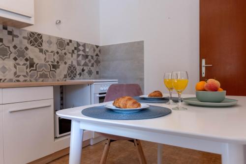 Η κουζίνα ή μικρή κουζίνα στο Apartman Duce Milka