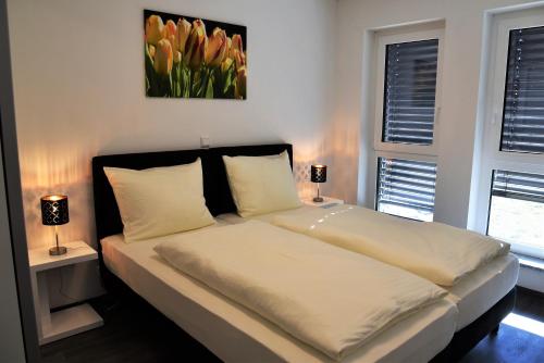 Кровать или кровати в номере Apartment Aurachtal Münchaurach