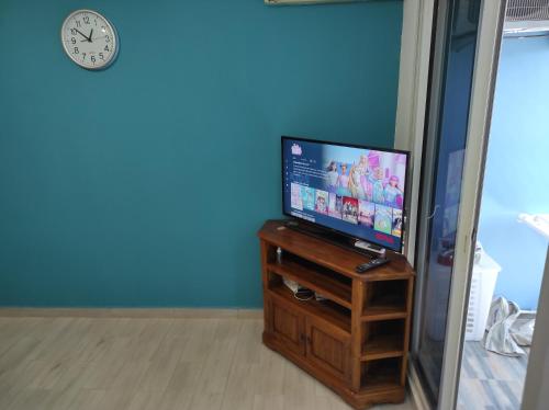 TV in/ali zabaviščno središče v nastanitvi STUDIO RENOVé # LA RESERVE #