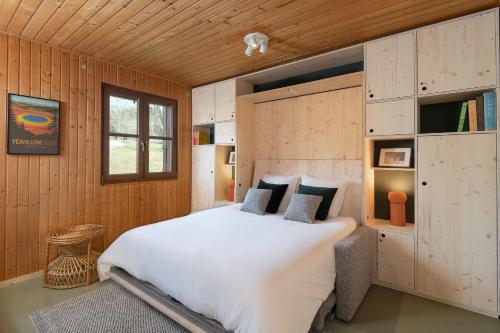 Postel nebo postele na pokoji v ubytování Chalet Panorama - luxe en altitude dans les Vosges