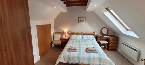 Postel nebo postele na pokoji v ubytování Ard Darach Cottage