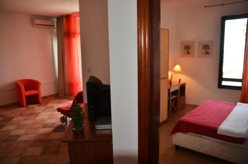 Ένα ή περισσότερα κρεβάτια σε δωμάτιο στο Apartments Secret Garden