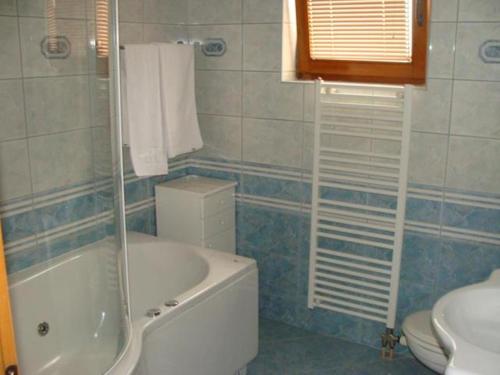 Koupelna v ubytování Hotel Delminium