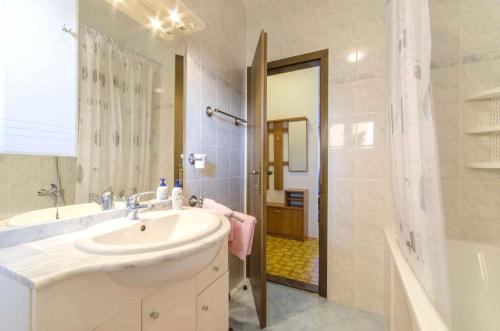 a bathroom with a sink and a shower at Apartment in Rovinj/Istrien 11533 in Rovinj