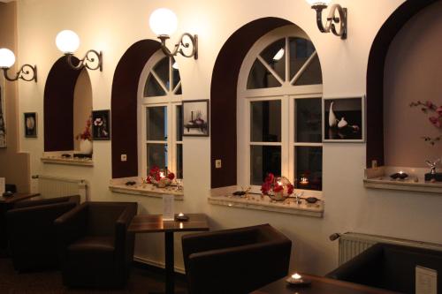 Χώρος καθιστικού στο Hotel am Schloss