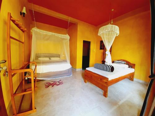 Postel nebo postele na pokoji v ubytování Serenity Homestay