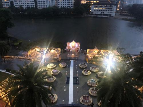 an aerial view of a parking lot at night at Flamingo Hotel By The Lake, Kuala Lumpur in Kuala Lumpur