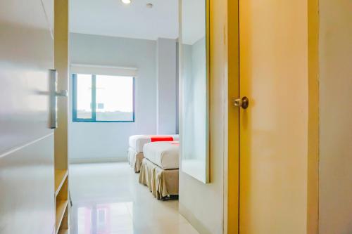 Ett badrum på Capital O 90244 Hotel Antara