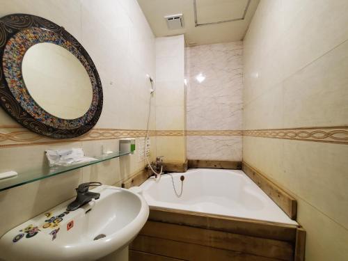 Ванная комната в Cocos Hot Spring Hotel