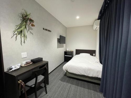 Katil atau katil-katil dalam bilik di Hotel de M