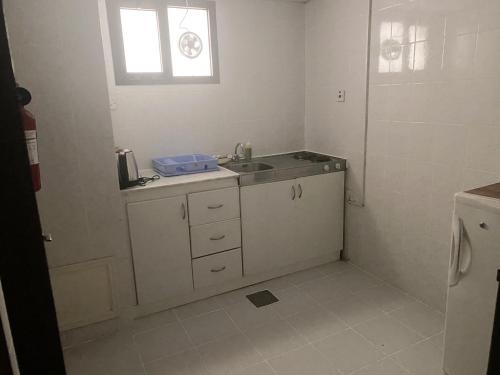 Vonios kambarys apgyvendinimo įstaigoje Al Buhaira Hotel Apartment