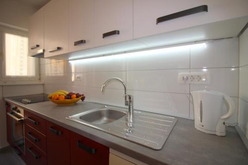 Kuchyň nebo kuchyňský kout v ubytování Apartment Agata in city center