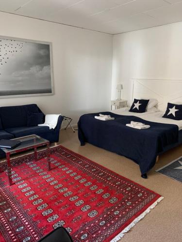 Postel nebo postele na pokoji v ubytování Hotell Kaprifol