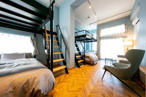 เตียงในห้องที่ VILLA KOSHIDO ODORI