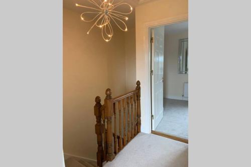 Кровать или кровати в номере Two Bedroom Town House Beside The River Barrow
