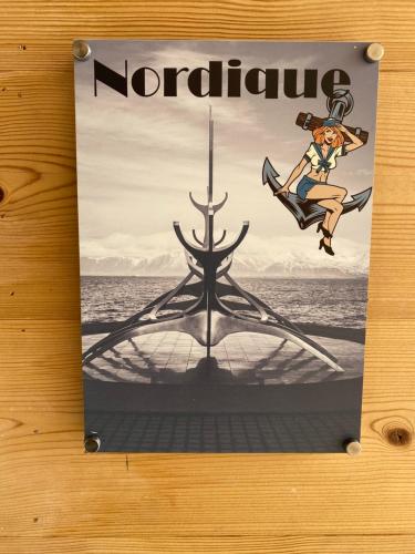 a sign for a nordic movie on a table at World Hotel in Saint-Vulbas