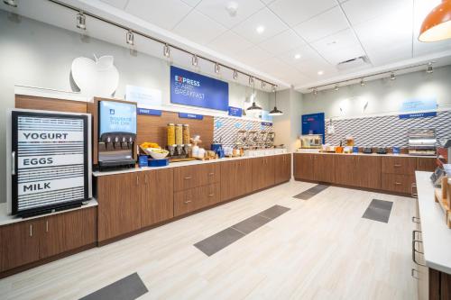 a view of the front counter of a mcdonalds restaurant at Holiday Inn Express & Suites - Fort Myers Airport by IHG in Fort Myers