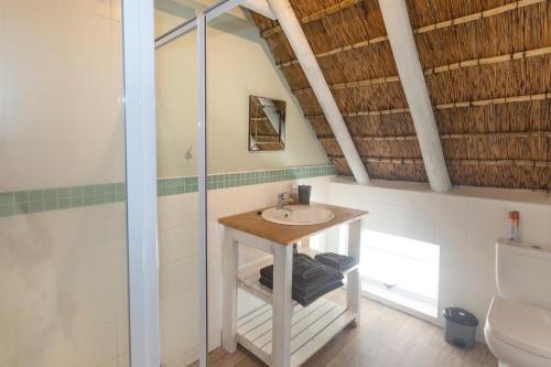 A bathroom at HERON at Cape St Francis Lifestyle Estate