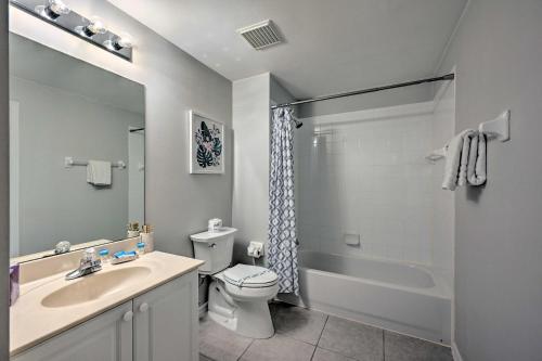 a bathroom with a sink and a toilet and a shower at Quiet Lely Resort Condo with Pool - 2 Mi to Golf! in Naples