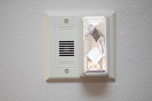 a white light switch on a white wall at Holiday Inn Express Hotel & Suites Longmont by IHG in Longmont
