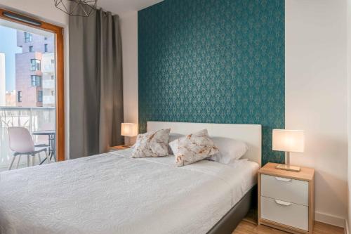 Postel nebo postele na pokoji v ubytování Dream4You Apartments