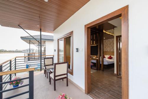 a balcony with a view of a bedroom at Lumbini Palace Resort in Lumbini