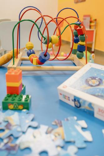 a table with a toy apparatus on a table at Hotel Chalet Del Brenta in Madonna di Campiglio