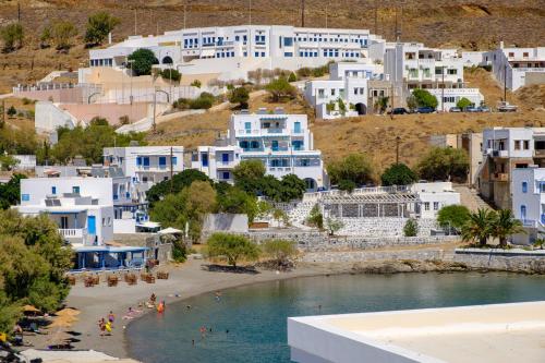 a view of a town with a beach and buildings at Maistrali in Astypalaia Town