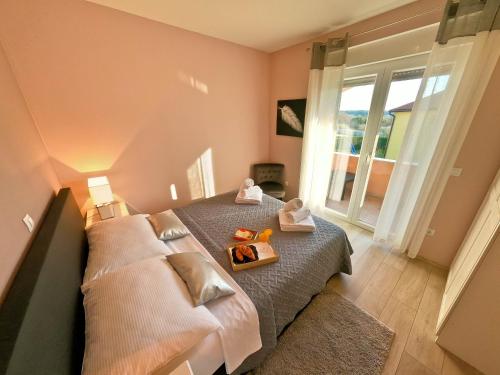 Postel nebo postele na pokoji v ubytování House Monte Cherpo