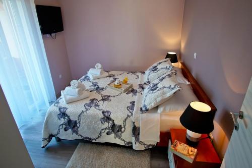 Postel nebo postele na pokoji v ubytování House Monte Cherpo