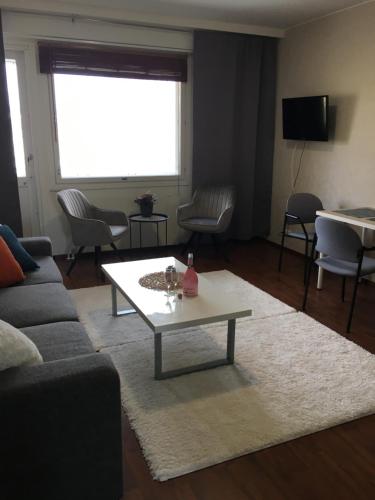 Телевизор и/или развлекательный центр в StarHomes City Apartment 48