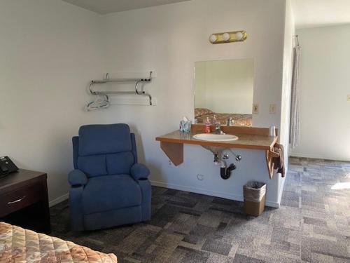 Χώρος καθιστικού στο Americas Best Value Inn