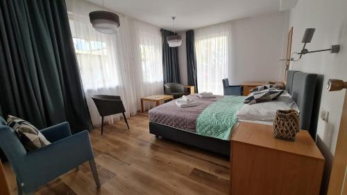 Postel nebo postele na pokoji v ubytování Chopina 29 Sopot Apartments