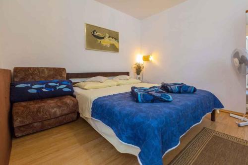 Posteľ alebo postele v izbe v ubytovaní Apartment in Crikvenica 39084