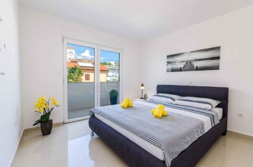 Postel nebo postele na pokoji v ubytování Apartment in Crikvenica 39077