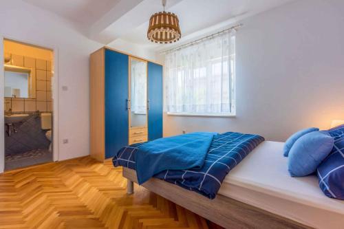 Posteľ alebo postele v izbe v ubytovaní Apartment in Crikvenica 39156