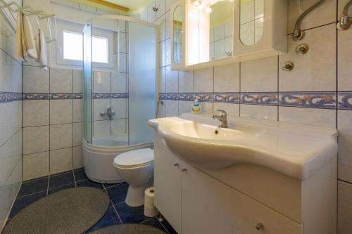 Kúpeľňa v ubytovaní Apartments in Selce 39174