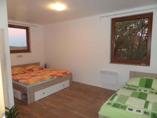 Postel nebo postele na pokoji v ubytování Holiday home in Neznasov/Südböhmen 26808