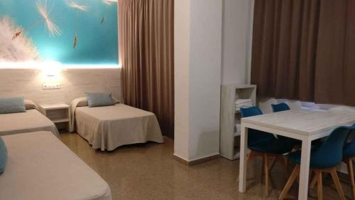 Posteľ alebo postele v izbe v ubytovaní Apartments Lloret de Mar/Costa Brava 3515