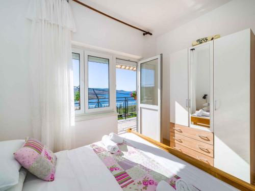 Posteľ alebo postele v izbe v ubytovaní Holiday home in Jasenice 33303