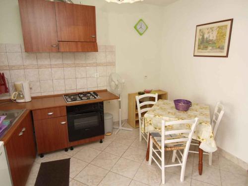 Kuchyň nebo kuchyňský kout v ubytování Apartment in Veli Losinj 14933