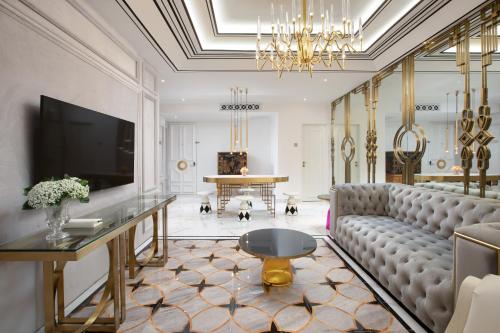 a living room with a couch and a table at arte by Thomas Chan in Kuala Lumpur