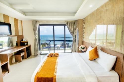 Postel nebo postele na pokoji v ubytování Oliver Hotel