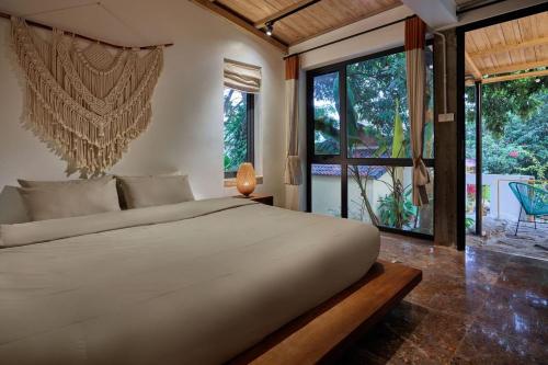 Cama o camas de una habitación en Bavi Annam Garden