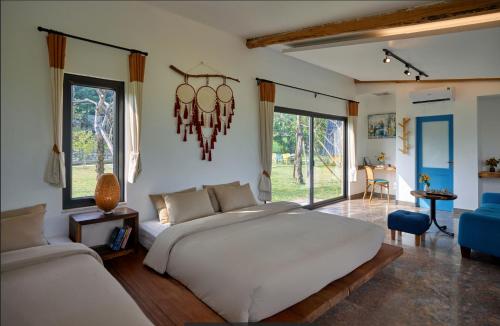 Cama o camas de una habitación en Bavi Annam Garden