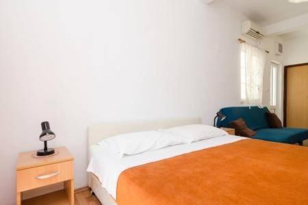 Katil atau katil-katil dalam bilik di Apartments Felix