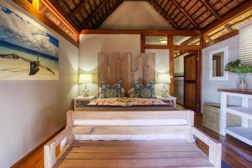 Una cama o camas en una habitación de Aloha 1