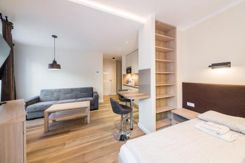 Posteľ alebo postele v izbe v ubytovaní Deluxe Apartment Rakowicka 15 WAWELOFTS